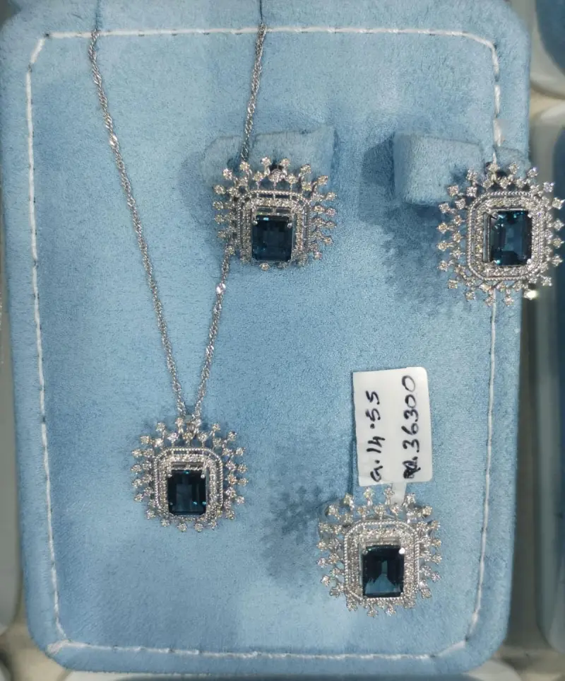 نص طقم الماس مع حجر التوباز